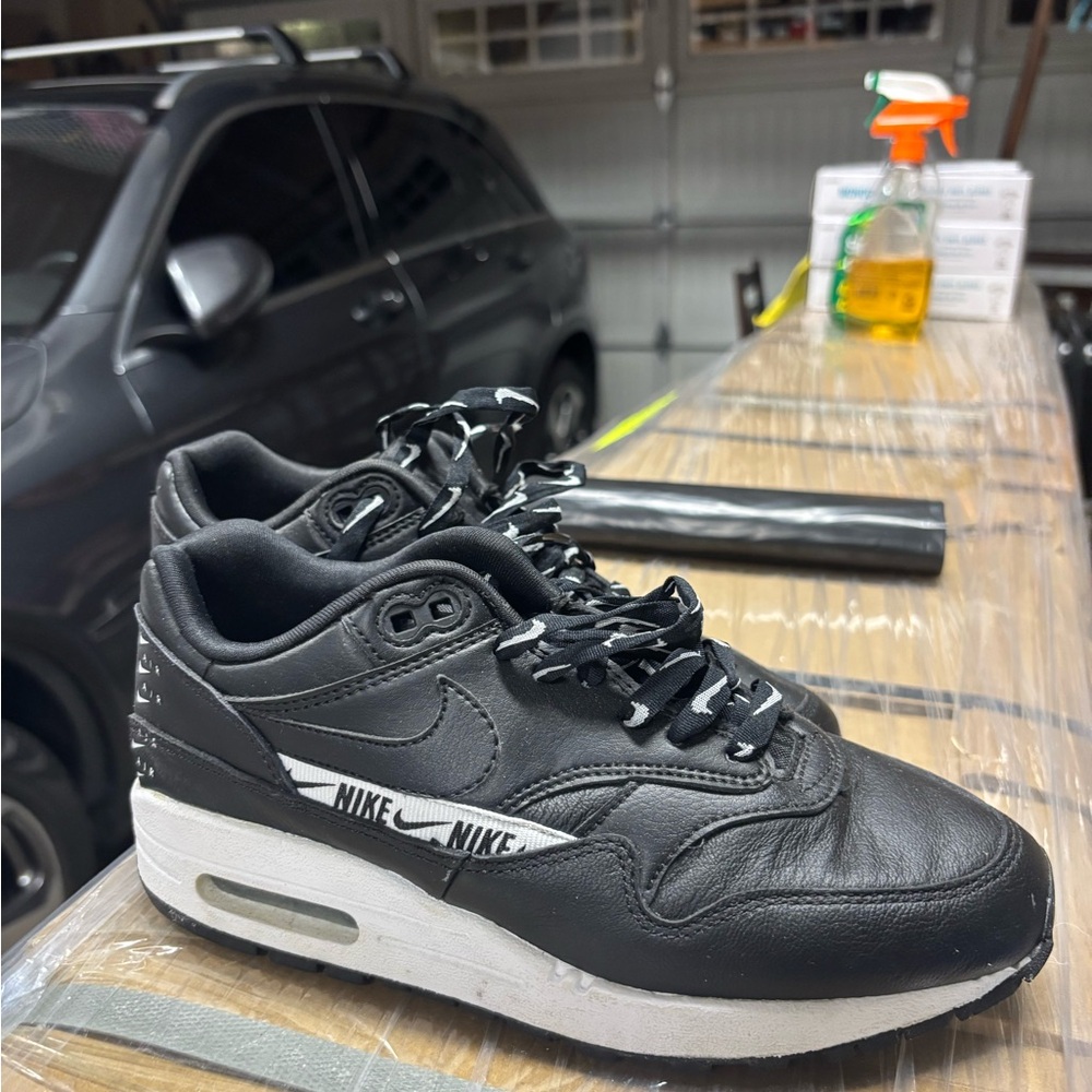 Black Nike Air Max 1 trainers